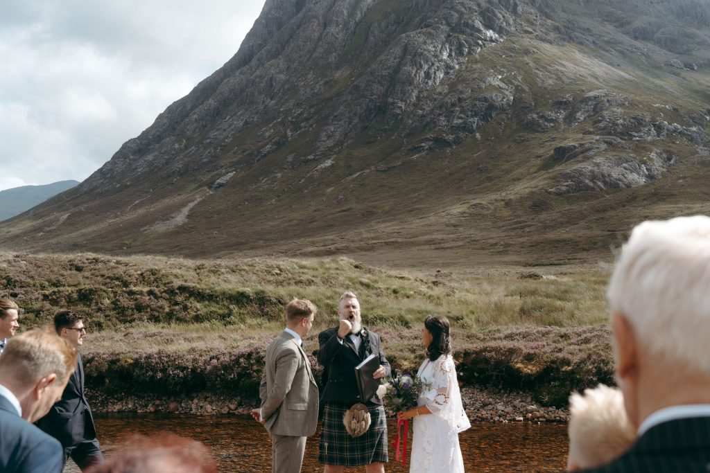 Mike & Hev's wedding at The Wee White House, Glencoe — drinks, confetti, everyone talking at once