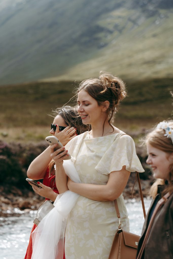 Mike & Hev's wedding at The Wee White House, Glencoe — drinks, confetti, everyone talking at once