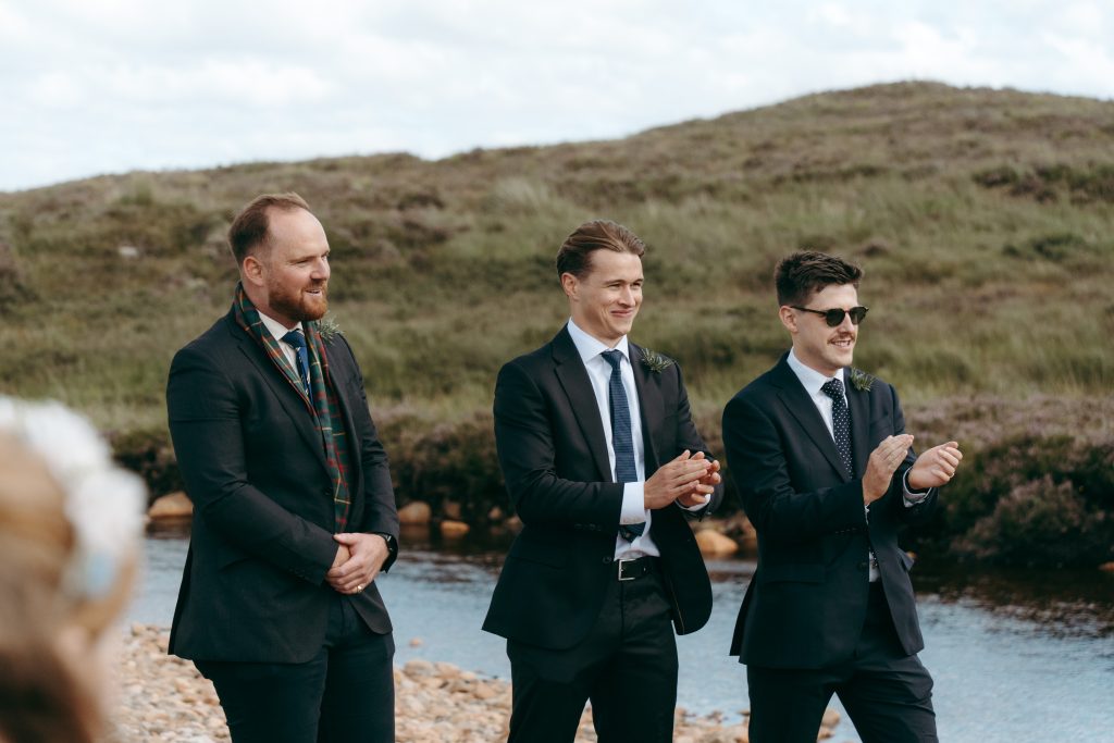 Mike & Hev's wedding at The Wee White House, Glencoe — drinks, confetti, everyone talking at once