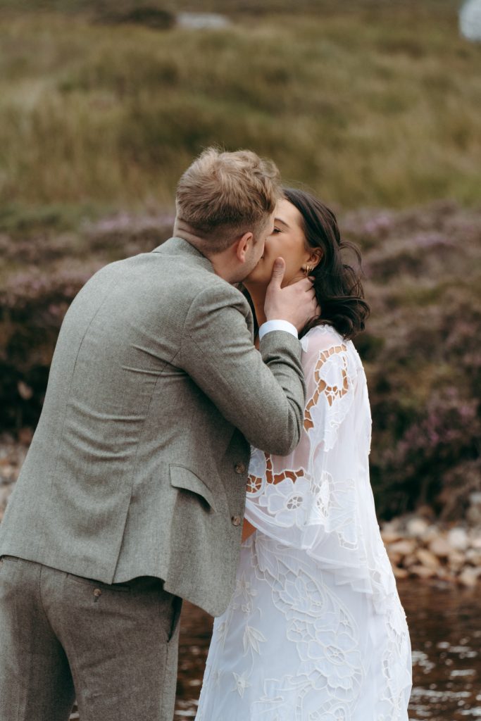Mike & Hev's wedding at The Wee White House, Glencoe — drinks, confetti, everyone talking at once