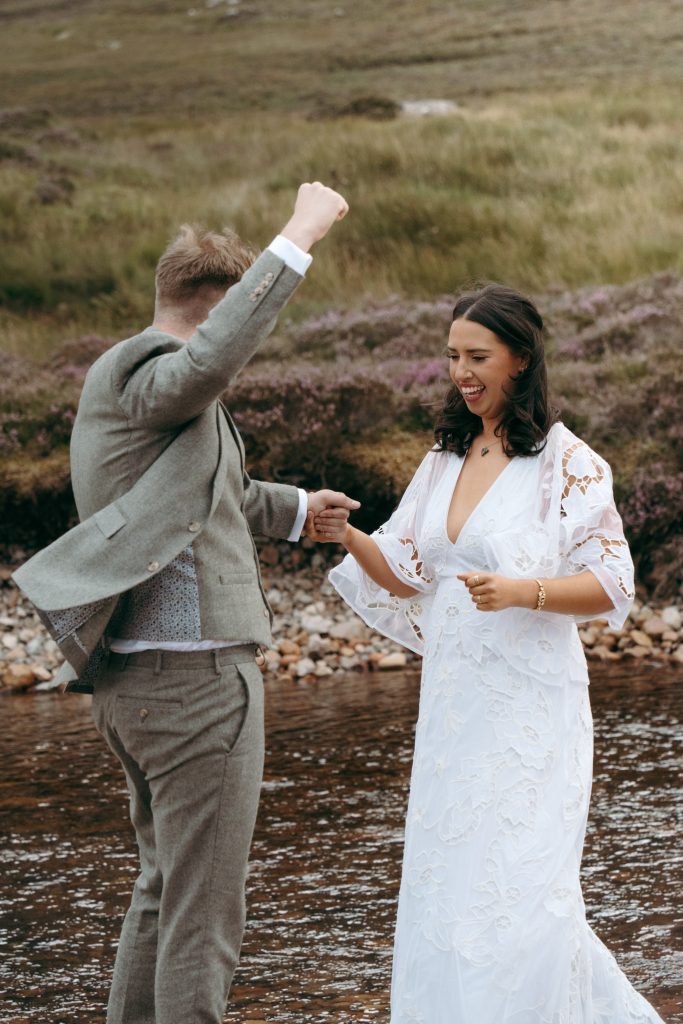 Mike & Hev's wedding at The Wee White House, Glencoe — drinks, confetti, everyone talking at once