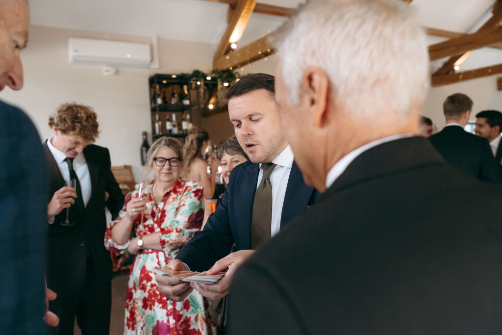 Libby & Tyler's wedding at The Hidden Oak, County Durham — confetti, drinks and guests socialising