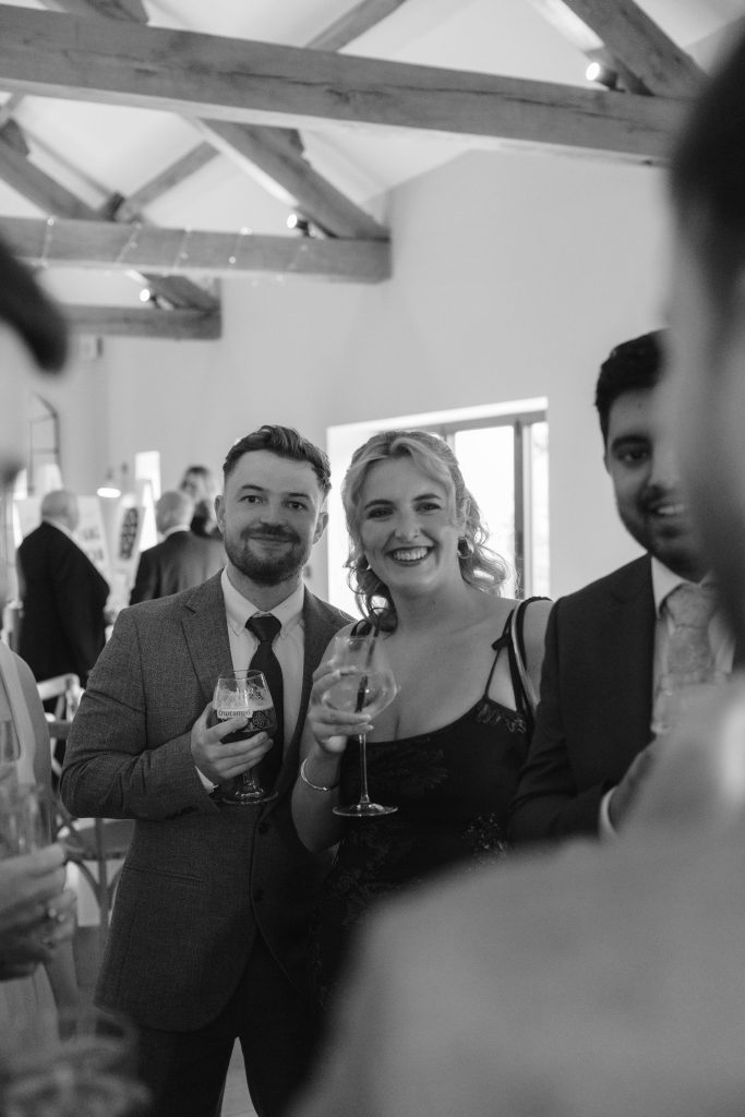 Libby & Tyler's wedding at The Hidden Oak, County Durham — confetti, drinks and guests socialising