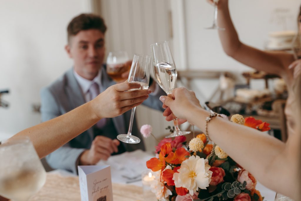 Libby & Tyler's wedding at The Hidden Oak, County Durham — confetti, drinks and guests socialising