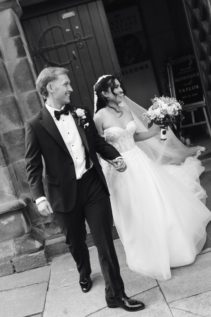 Monique & Taylor's wedding at Teeside Vineyard Church — drinks, confetti, everyone talking at once