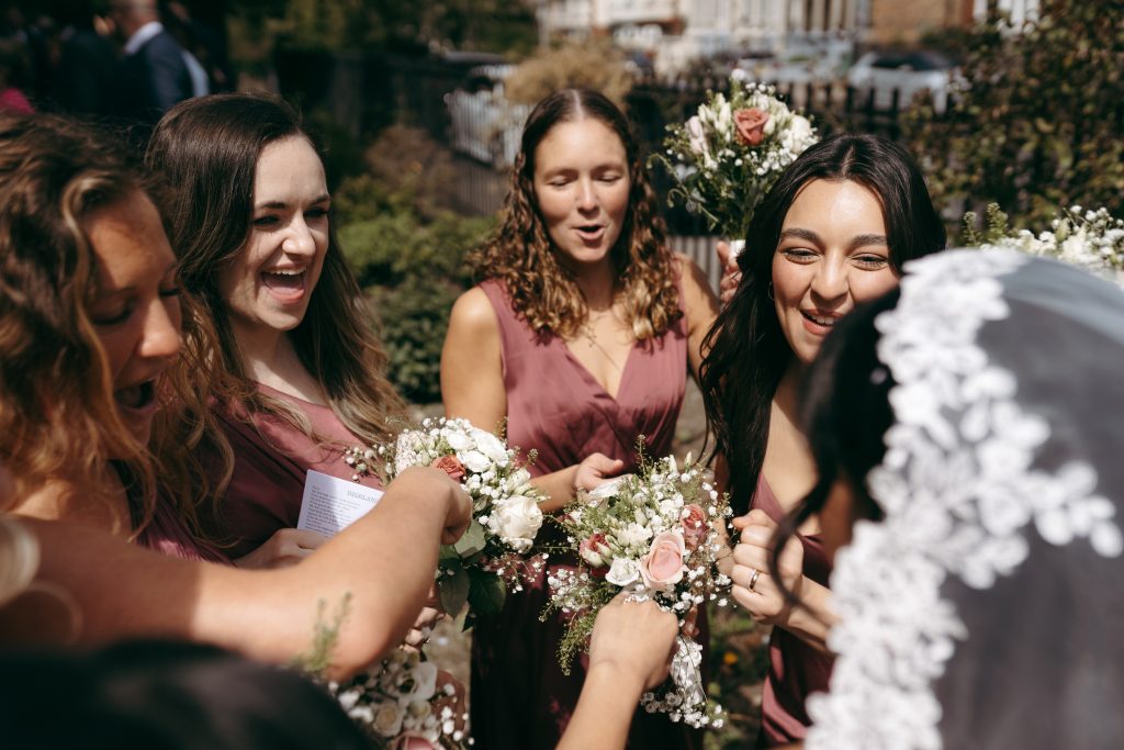 Monique & Taylor's wedding at Teeside Vineyard Church — drinks, confetti, everyone talking at once