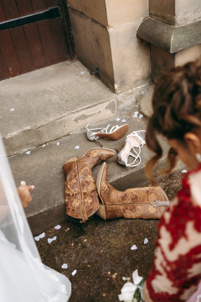 Monique & Taylor's wedding at Teeside Vineyard Church — drinks, confetti, everyone talking at once